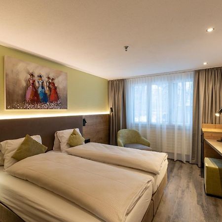 Hotel Flamatt Bagian luar foto